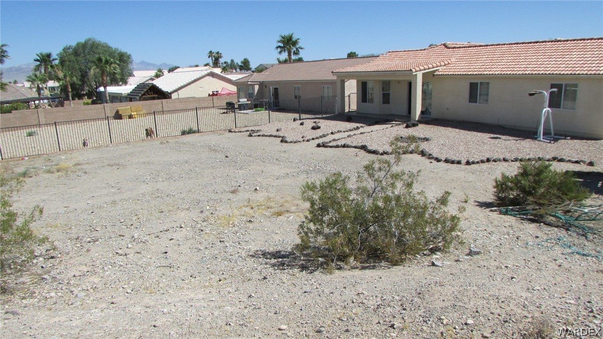 2188 Jamie Road Fort Mohave, AZ 86426 - Photo 21 of 21 a front view of a house with a yard