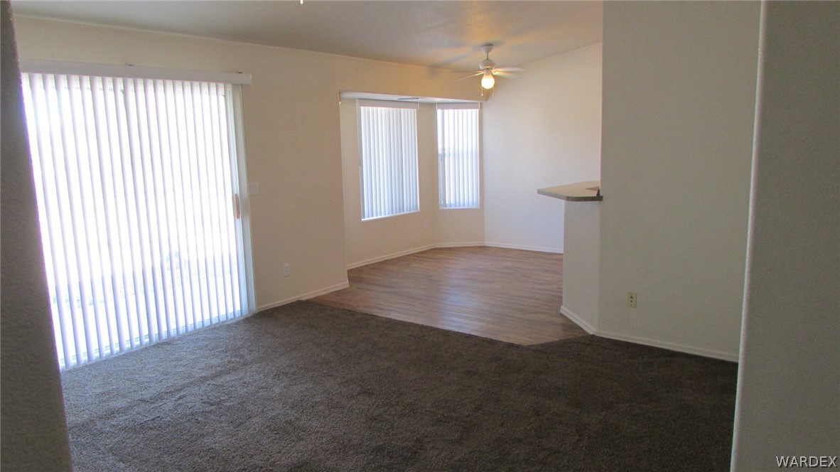 2188 Jamie Road Fort Mohave, AZ 86426 - Photo 6 of 21 an empty room with windows