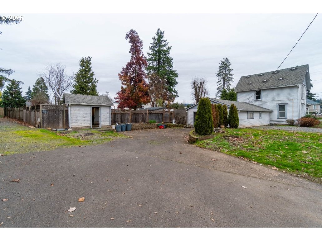 243 North Lane Street Cottage Grove, OR 97424 - Photo 14 of 22 a view of a house with a yard
