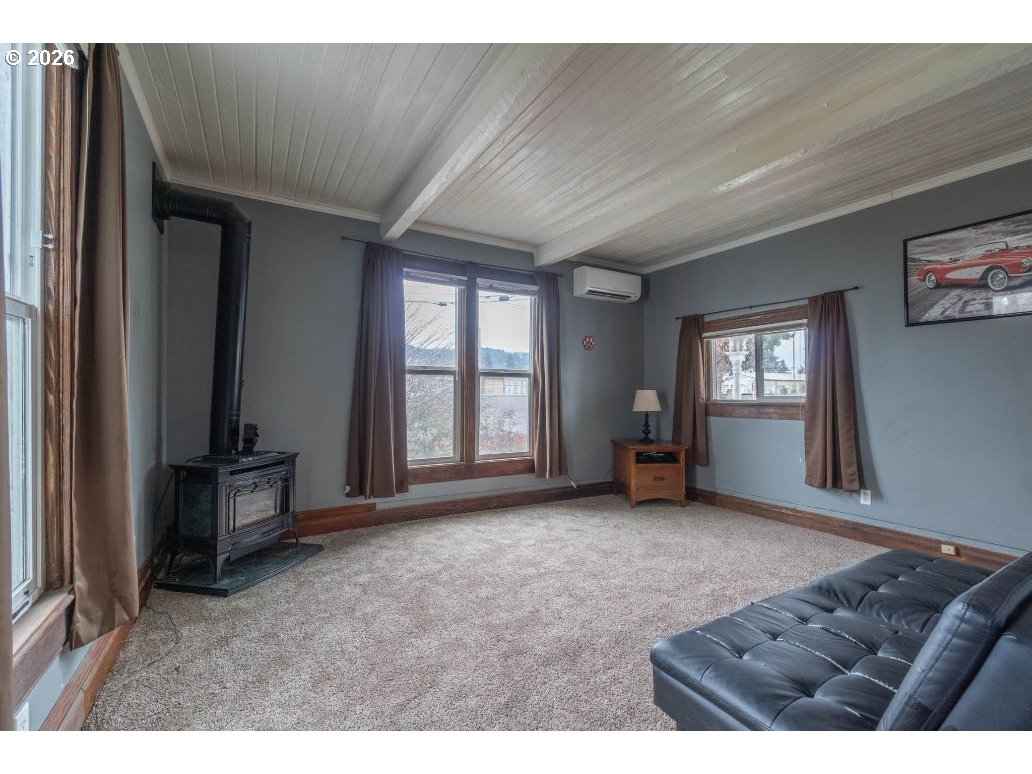 243 North Lane Street Cottage Grove, OR 97424 - Photo 5 of 22 a view of an empty room and window