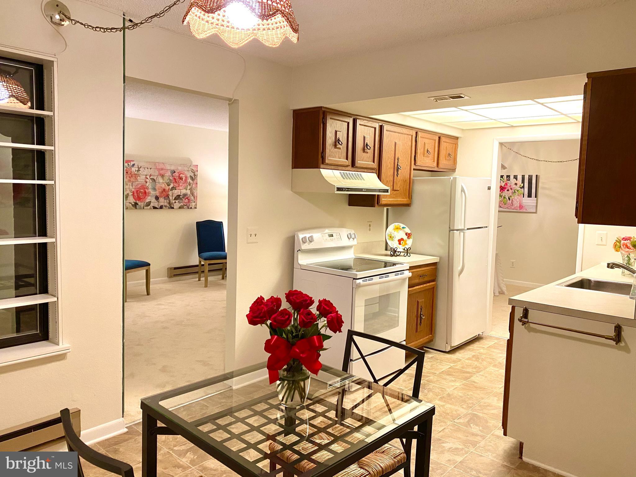 15311 Beaverbrook Court, Unit 902A Silver Spring, MD 20906 - Photo 14 of 38 Table space in the kitchen