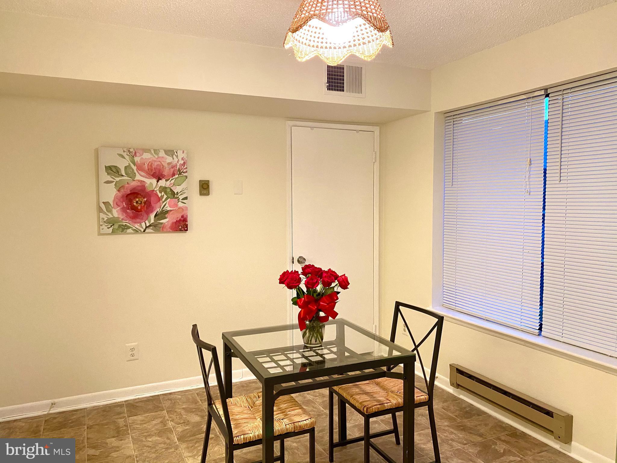 15311 Beaverbrook Court, Unit 902A Silver Spring, MD 20906 - Photo 16 of 38 Space for table in the kitchen