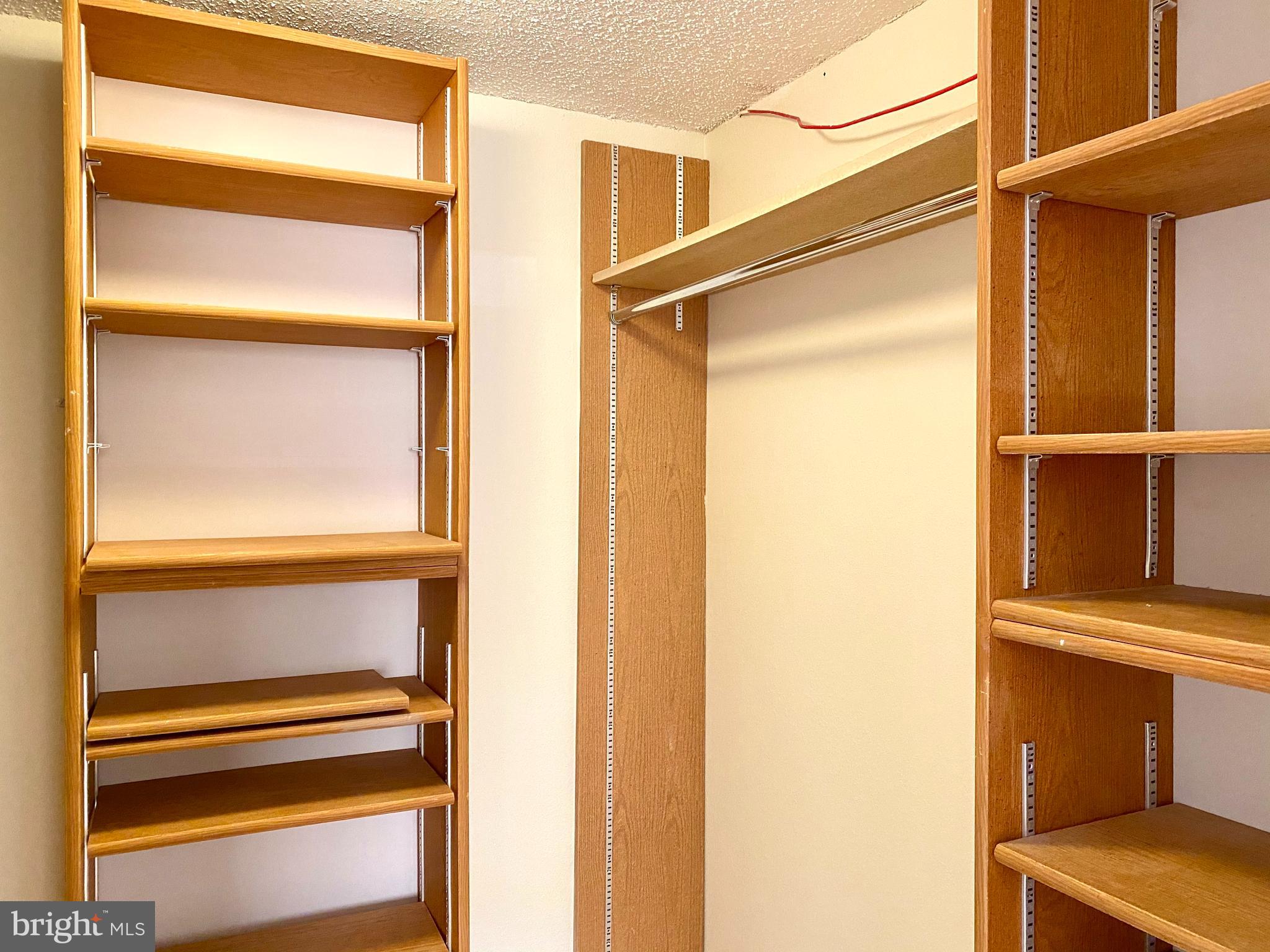 15311 Beaverbrook Court, Unit 902A Silver Spring, MD 20906 - Photo 24 of 38 Walk-in closet in primary bedroom