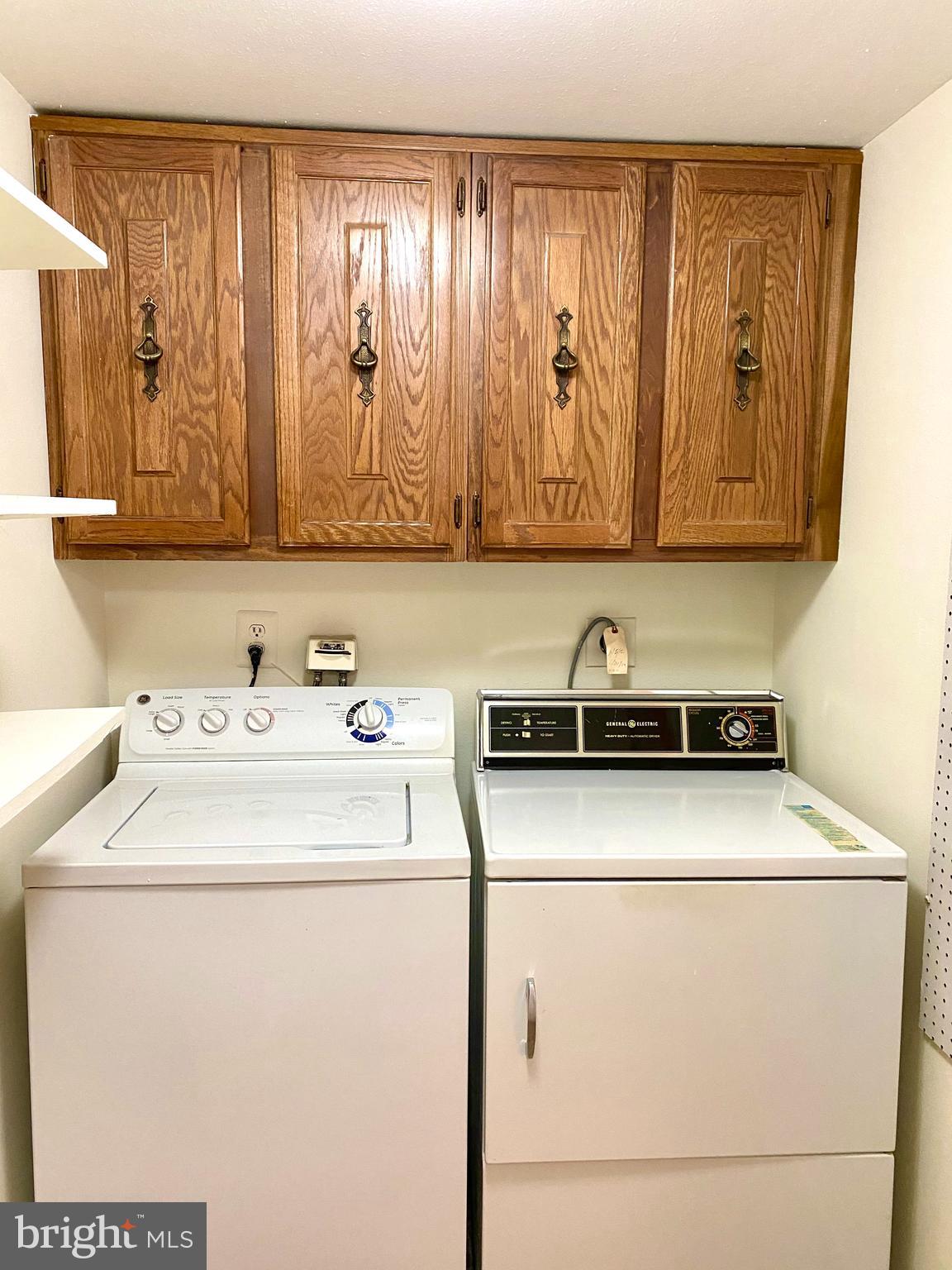 15311 Beaverbrook Court, Unit 902A Silver Spring, MD 20906 - Photo 27 of 38 Separate laundry & storage room, washer and dryer