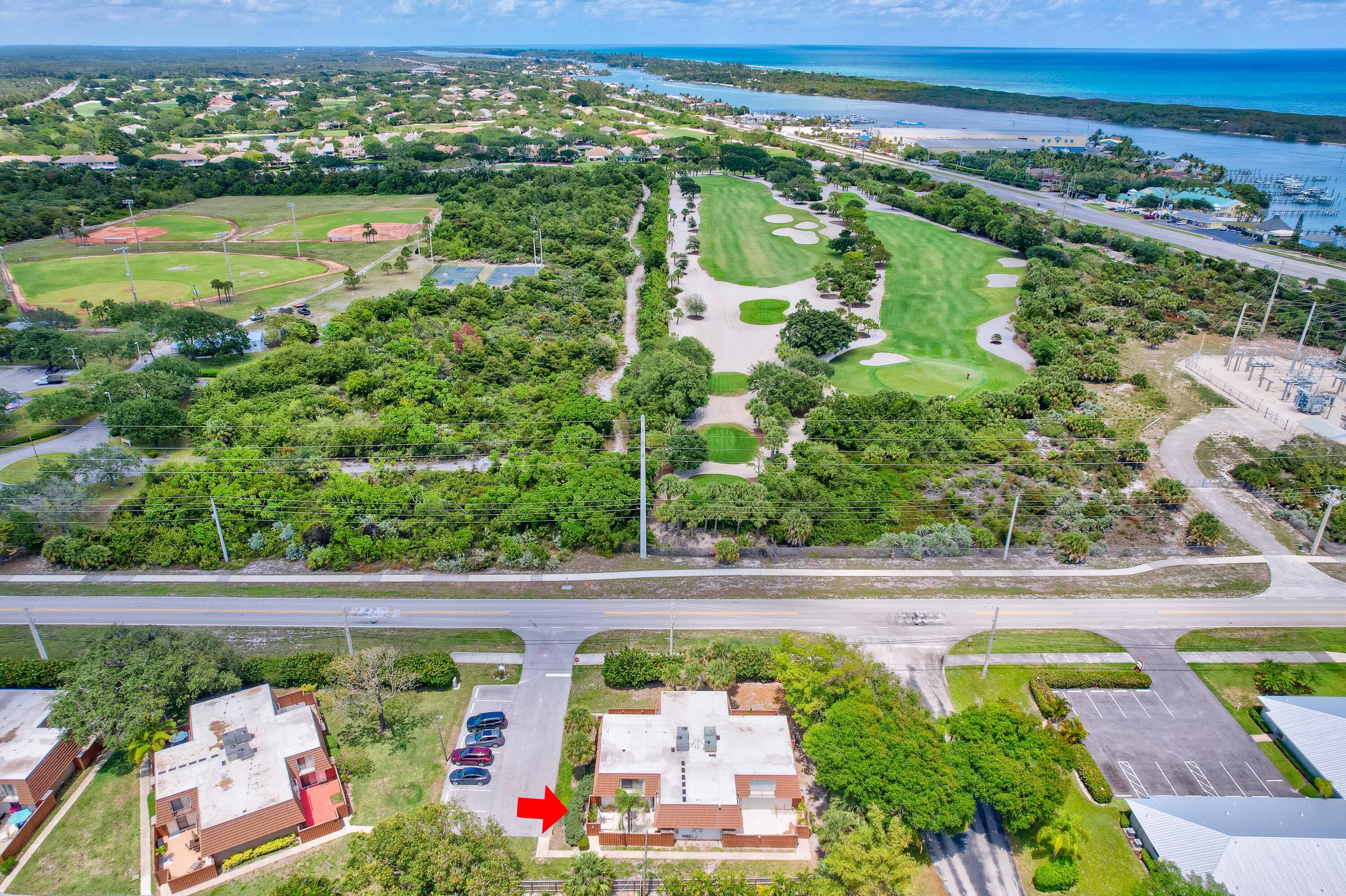 3900 County Line Road, Unit 1C Tequesta, FL 33469 - Photo 27 of 30 Golf and blue waters!