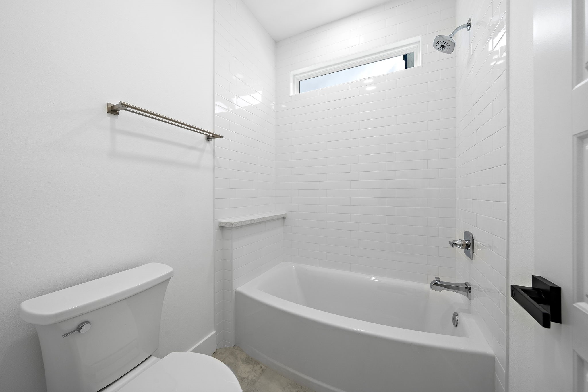 4012 Cetti Street Houston, TX 77009 - Photo 12 of 19 a white bath tub sitting next to a toilet