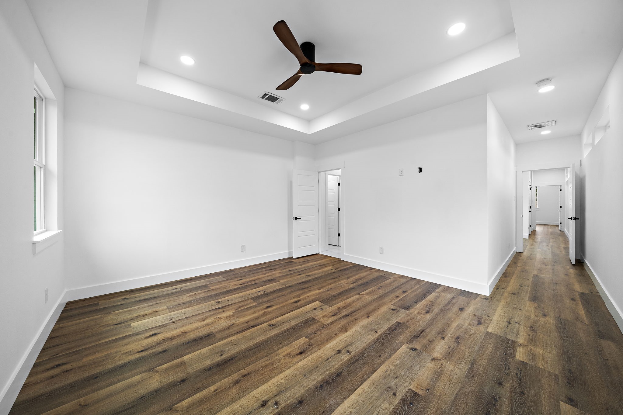 4012 Cetti Street Houston, TX 77009 - Photo 15 of 19 a view of empty room with wooden floor