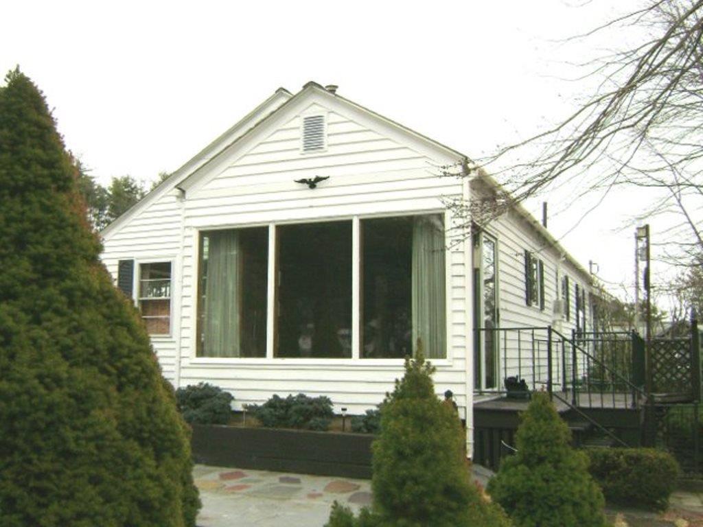 27 Ocean Park Road Saco, ME 04072 - Photo 28 of 28 Side, exterior view of sunroom and...