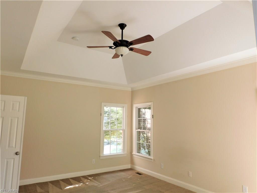 6007 Chalet Drive Oak Ridge, NC 27310 - Photo 8 of 30 Beautiful trey ceiling master sized for King Furniture!
