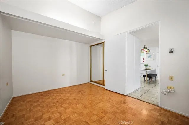 a view of a car parked in front of a house