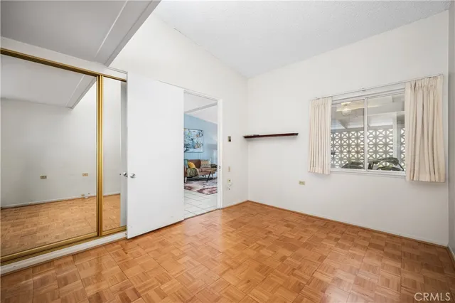 a kitchen with stainless steel appliances granite countertop a stove and cabinets