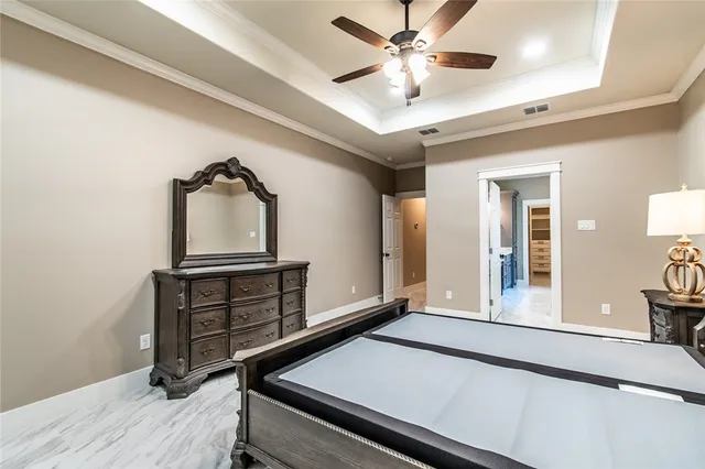 a bathroom with a double vanity sink a vanity and a shower