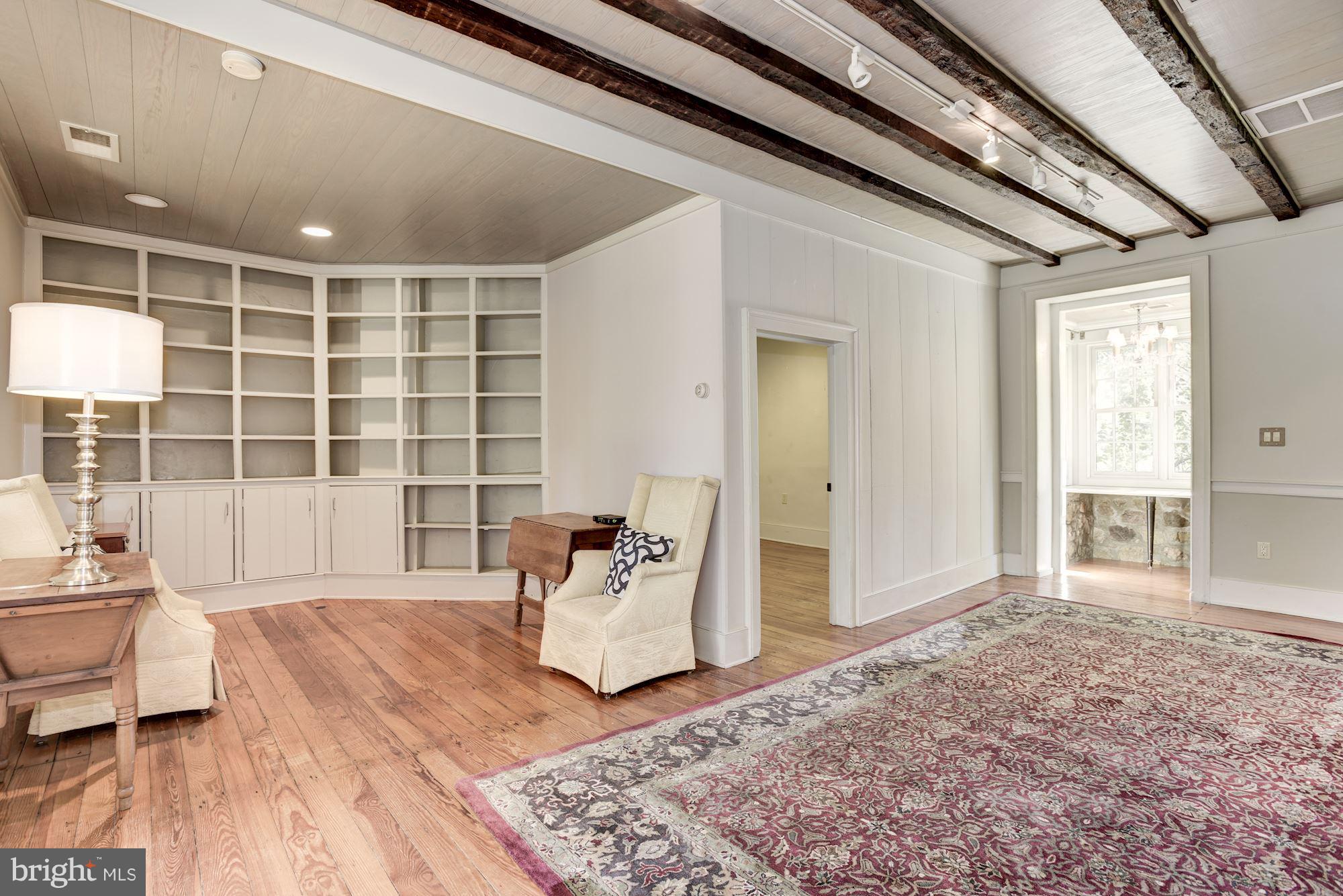 18822 Woodburn Road Leesburg, VA 20175 - Photo 9 of 30 Living Room with built in bookshelves