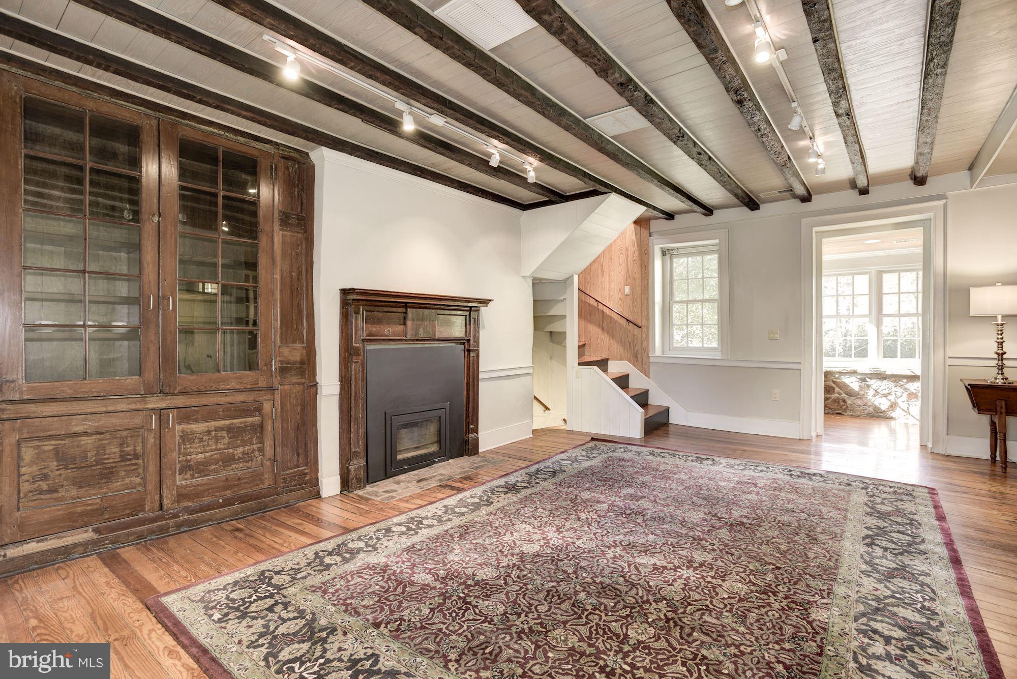 18822 Woodburn Road Leesburg, VA 20175 - Photo 10 of 30 Living Room with wood burning fireplace