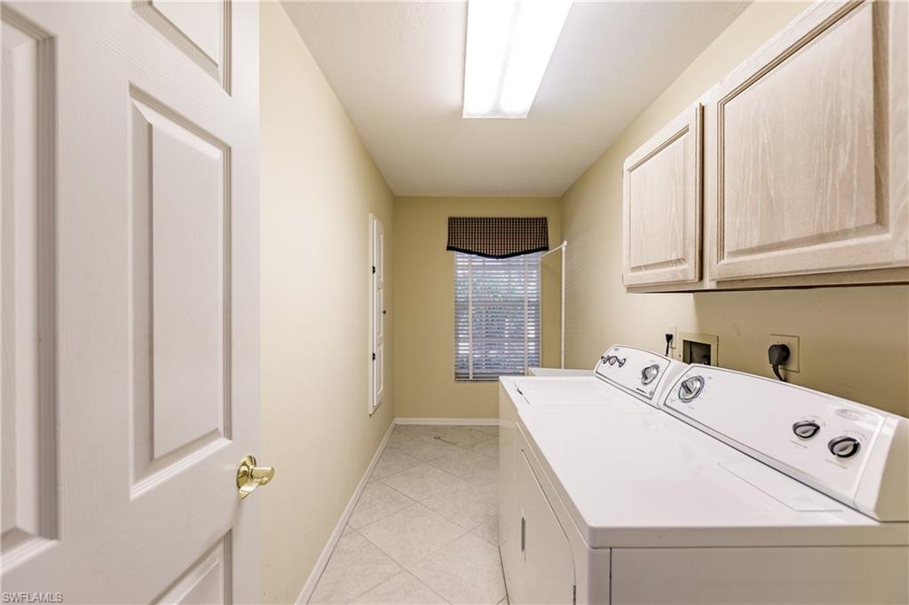131 Napa Ridge Way Naples, FL 34119 - Photo 28 of 34 a utility room with dryer and washer