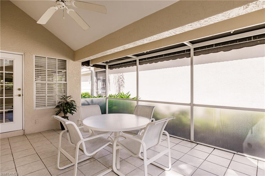 131 Napa Ridge Way Naples, FL 34119 - Photo 32 of 34 a dining room with furniture and window