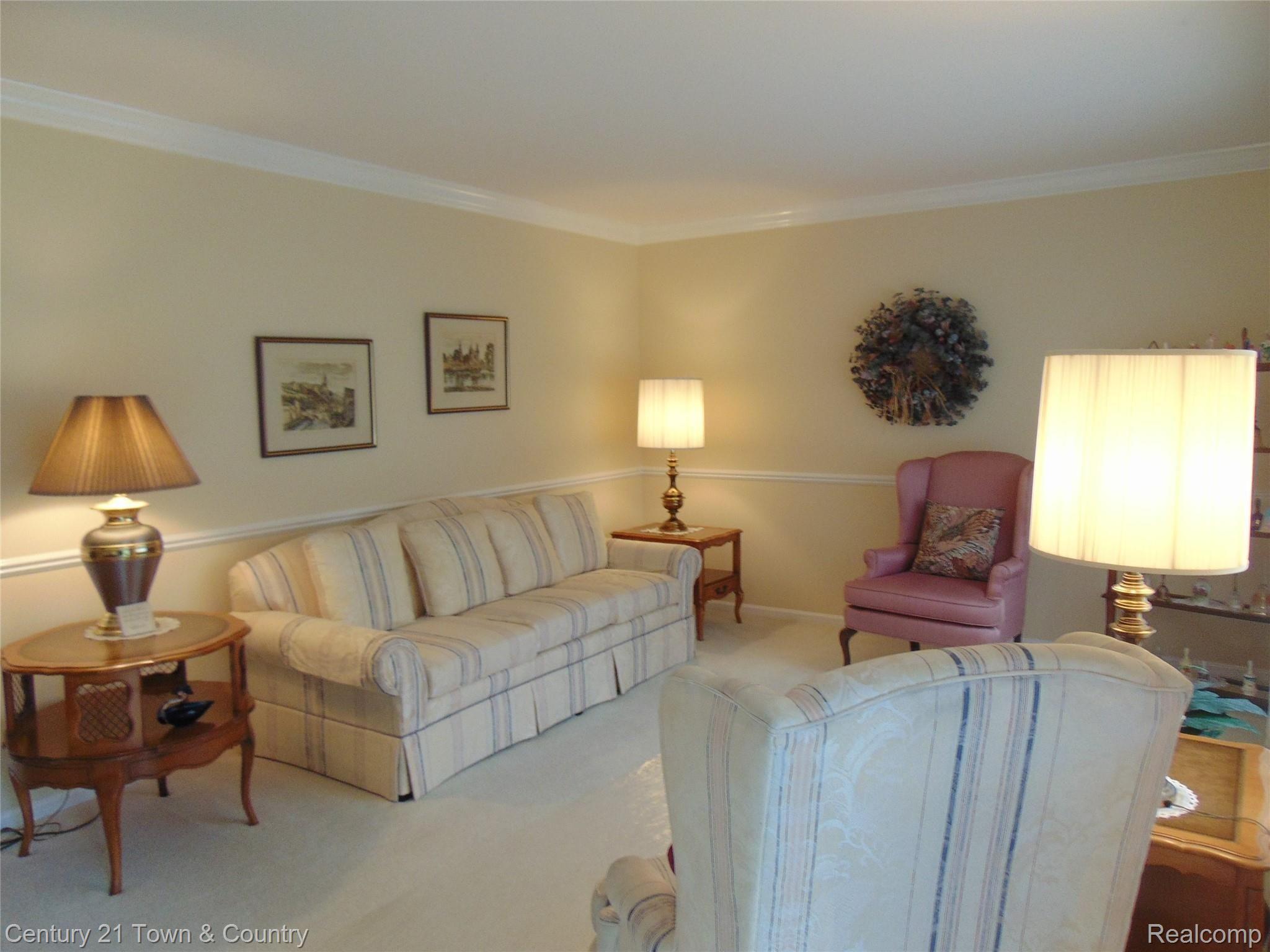 9555 Ridge Top Trail Clarkston, MI 48348 - Photo 4 of 49 Another Living Room View with Chair Rail & Crown Molding....