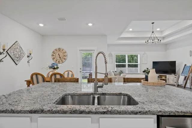 a view of a dining room with furniture