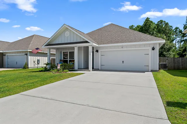 a view of outdoor space yard and garage
