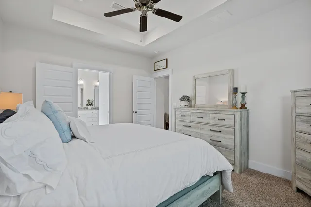 a bathroom with a sink a mirror and a bathtub