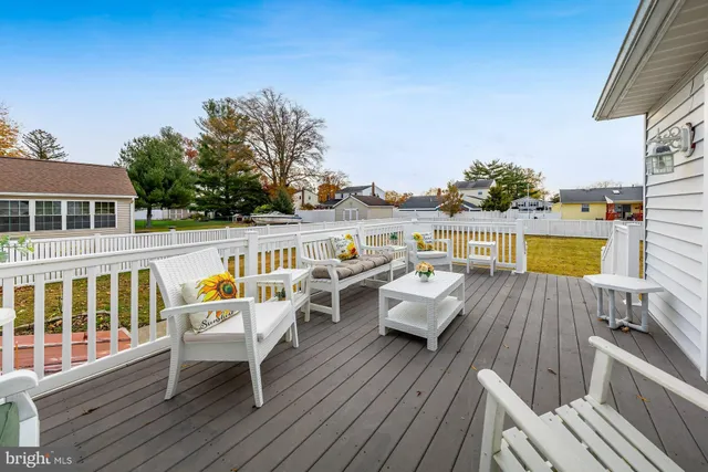 a view of roof deck with patio
