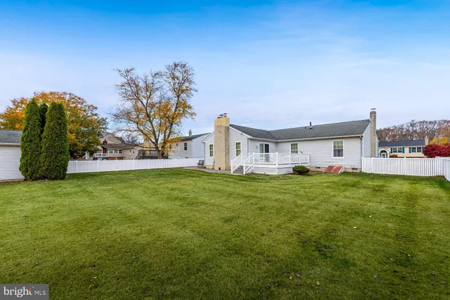 a view of a house with a big yard