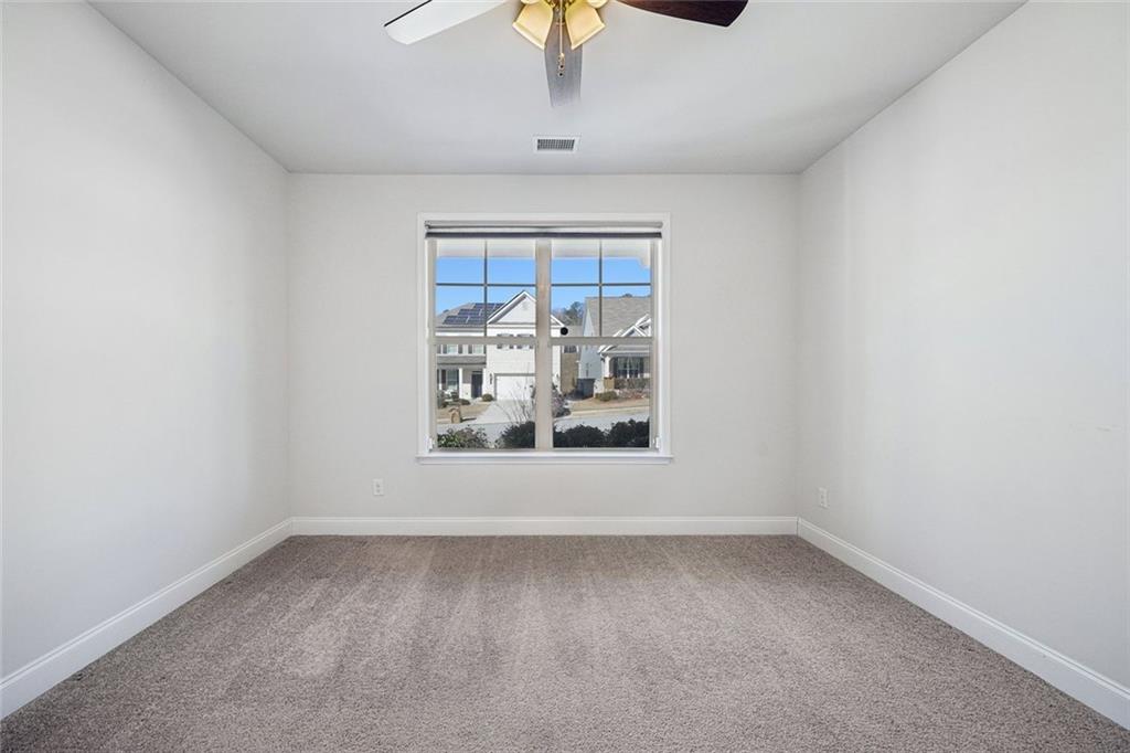 3431 High Shoals Buford, GA 30519 - Photo 22 of 51 an empty room with a window