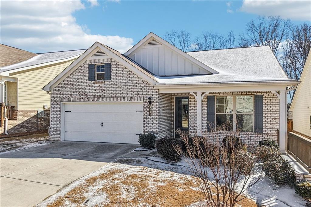 3431 High Shoals Buford, GA 30519 - Photo 32 of 51 a front view of a house with garden