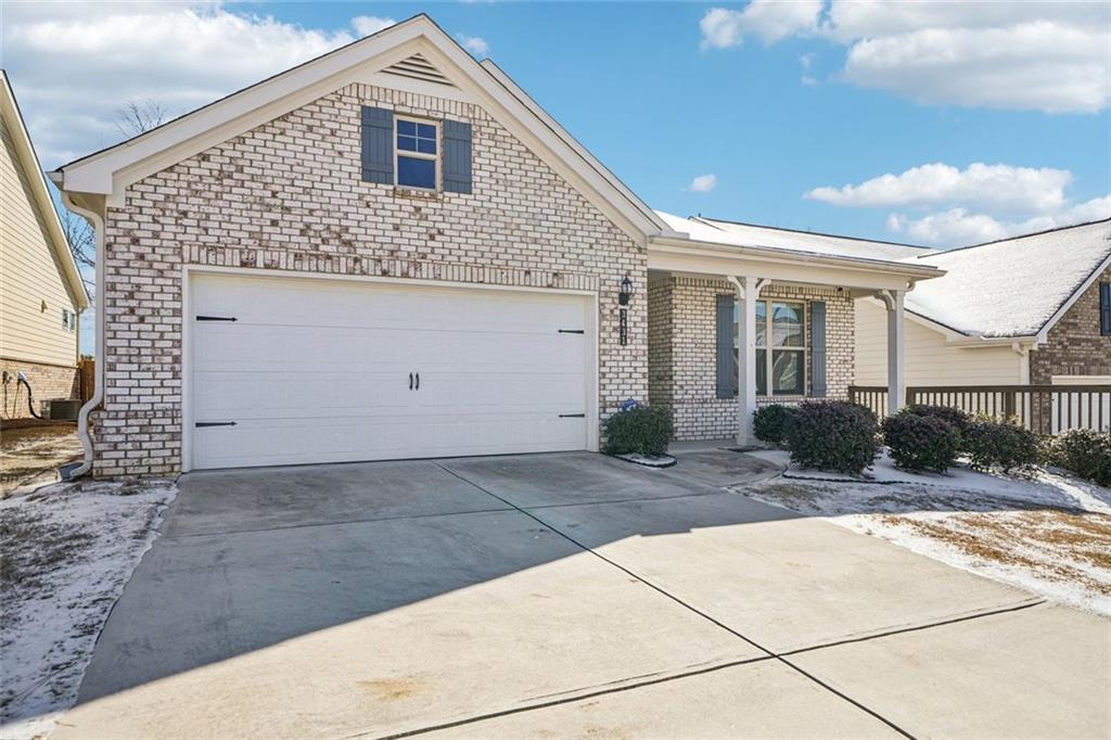 3431 High Shoals Buford, GA 30519 - Photo 33 of 51 a front view of a house with a yard