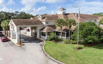 an aerial view of a house with garden