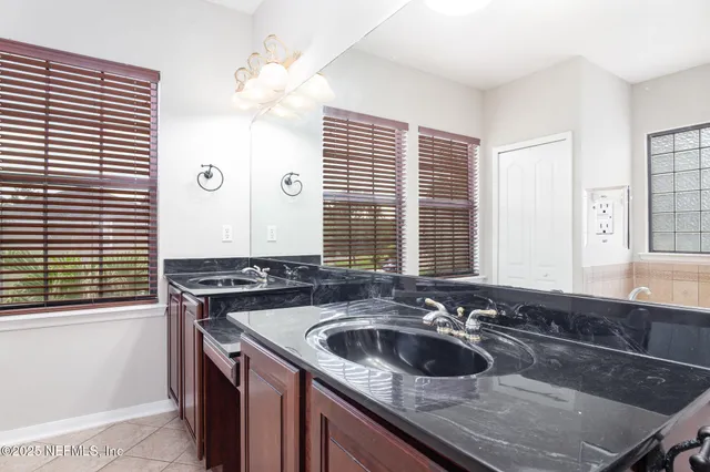 a kitchen with a sink and a stove