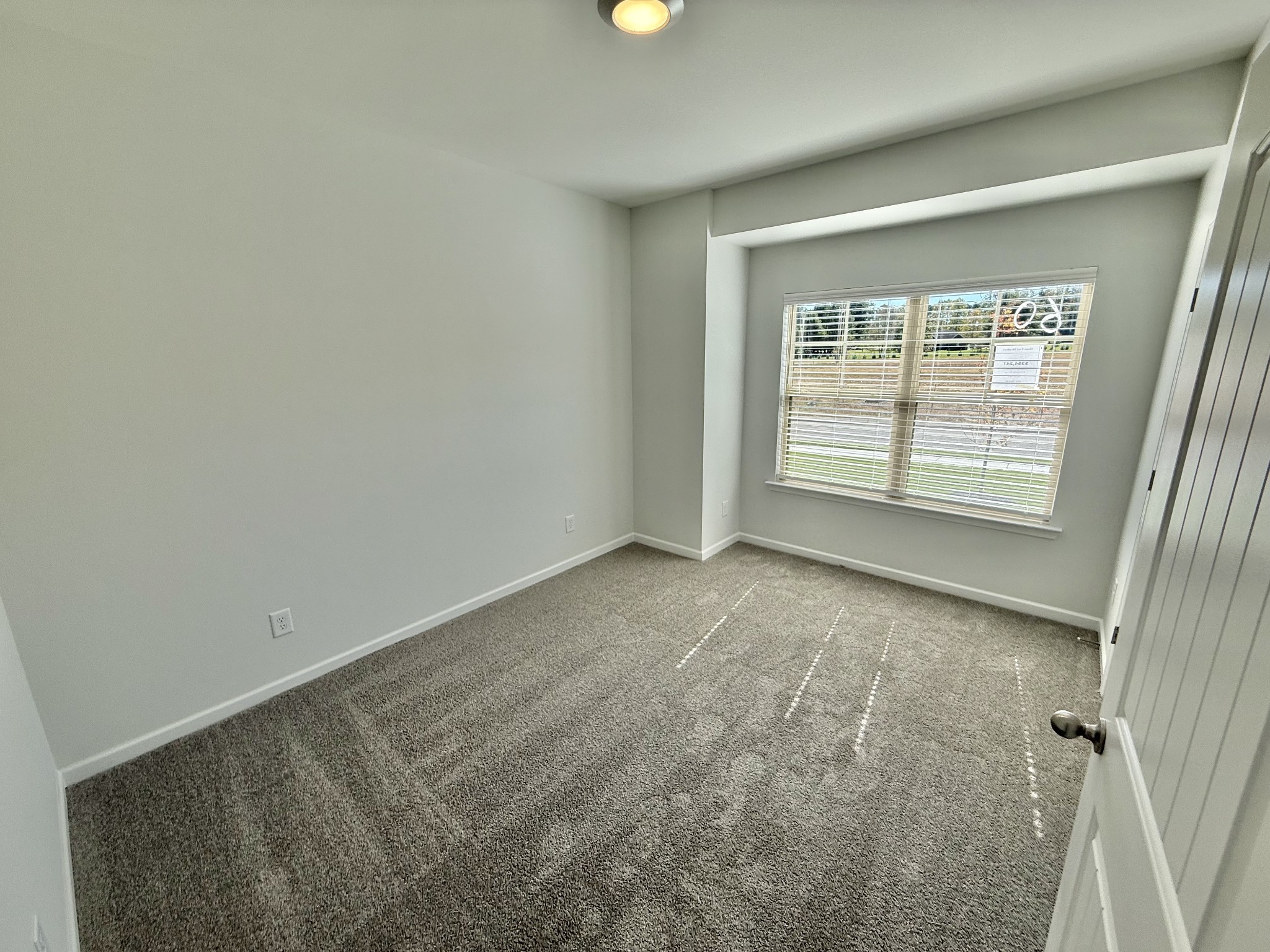 25 Ellie Jan Way Manchester, TN 37355 - Photo 11 of 12 an empty room with windows