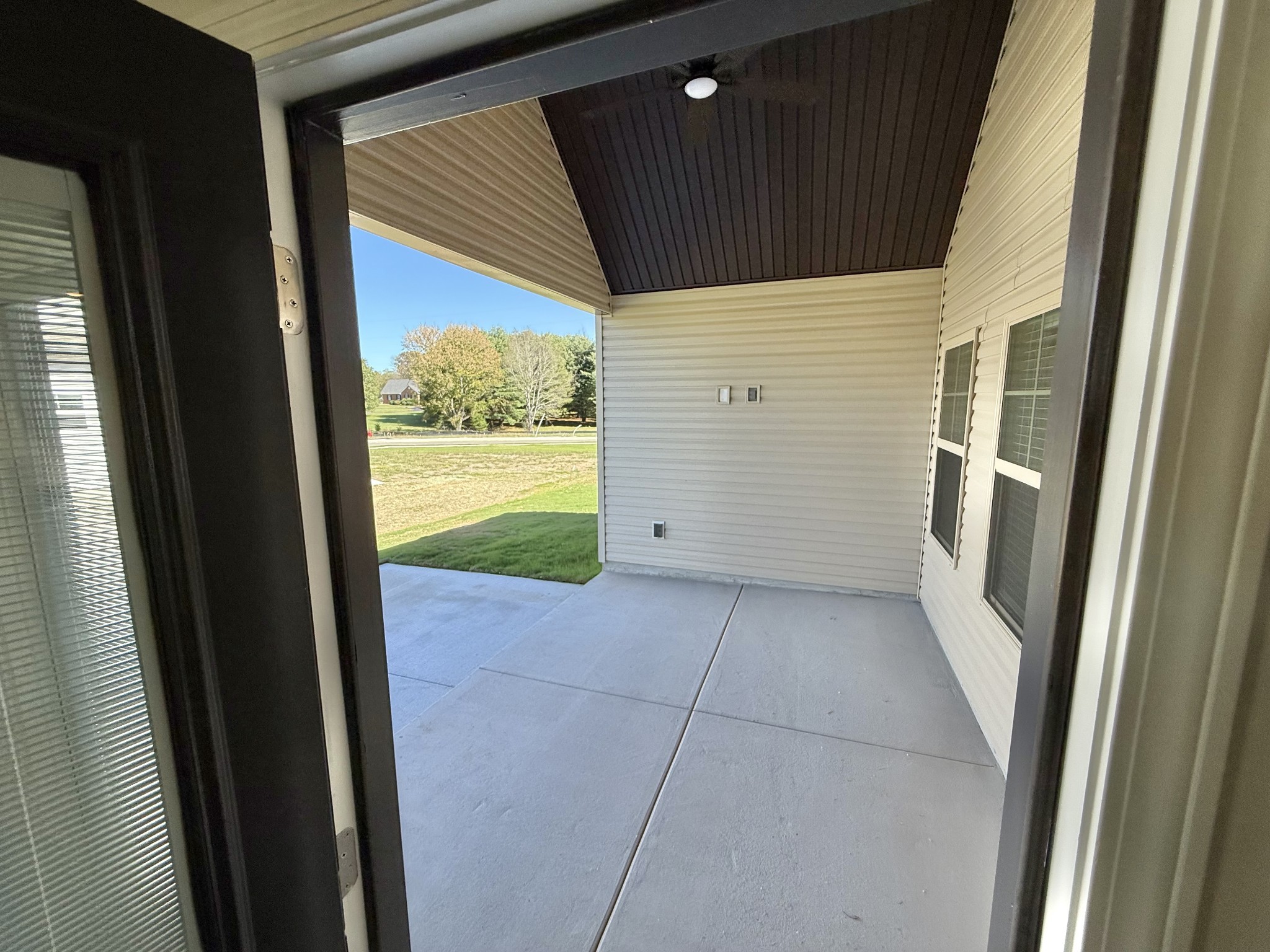 25 Ellie Jan Way Manchester, TN 37355 - Photo 6 of 12 a view of a back yard from a window