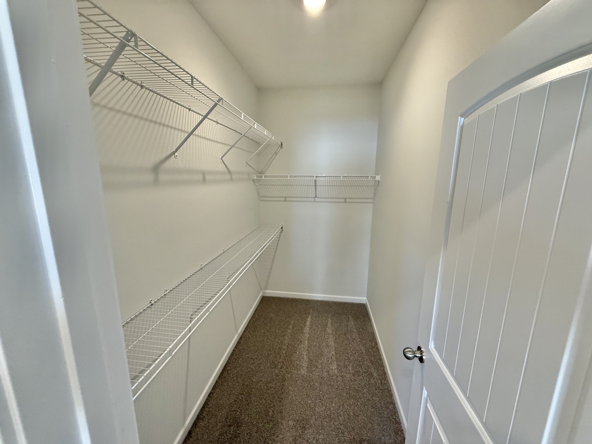 25 Ellie Jan Way Manchester, TN 37355 - Photo 9 of 12 a view of a walk in closet