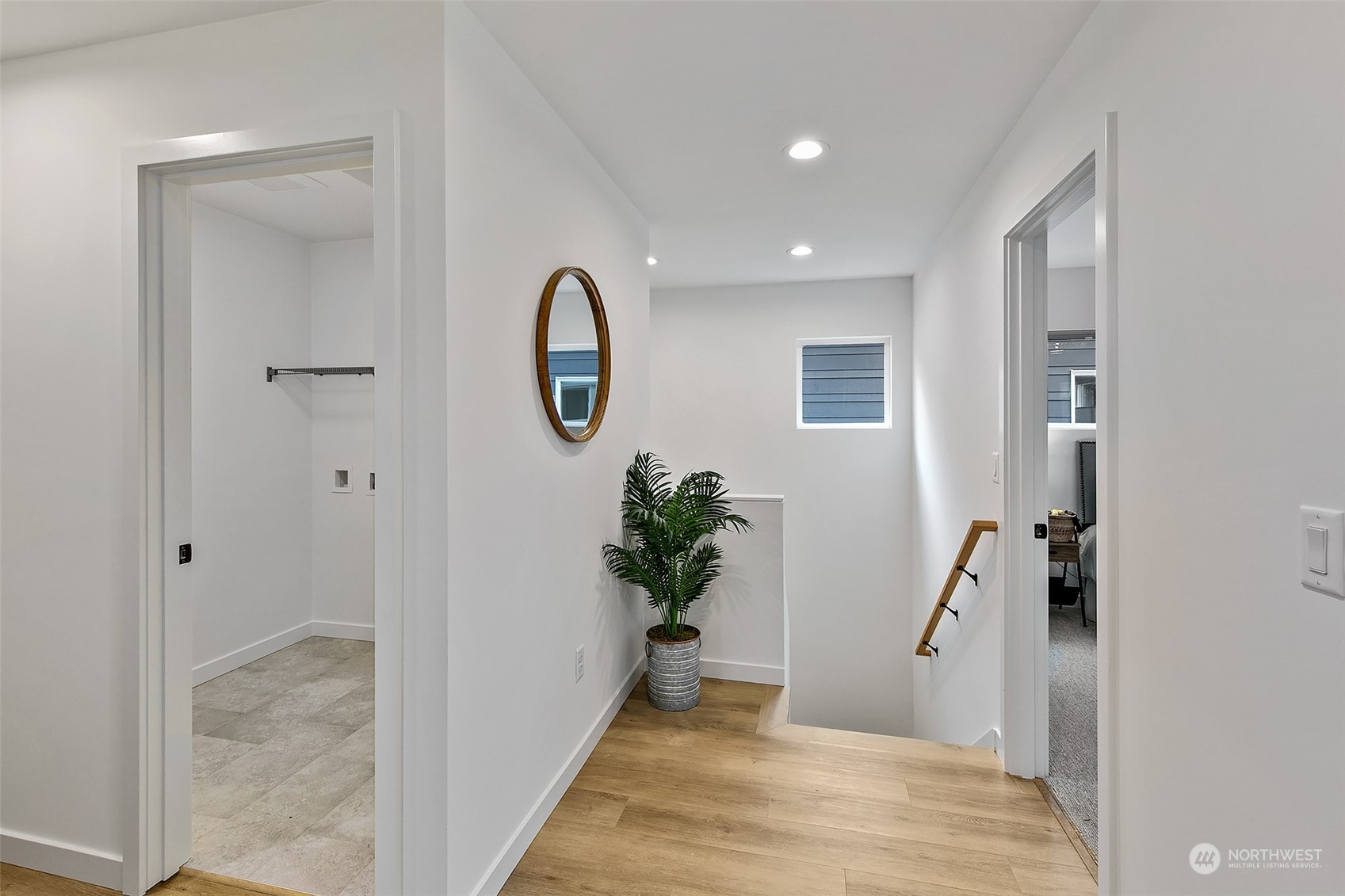 8855 29th Avenue Southwest Seattle, WA 98126 - Photo 12 of 20 a view of hallway with wooden floor