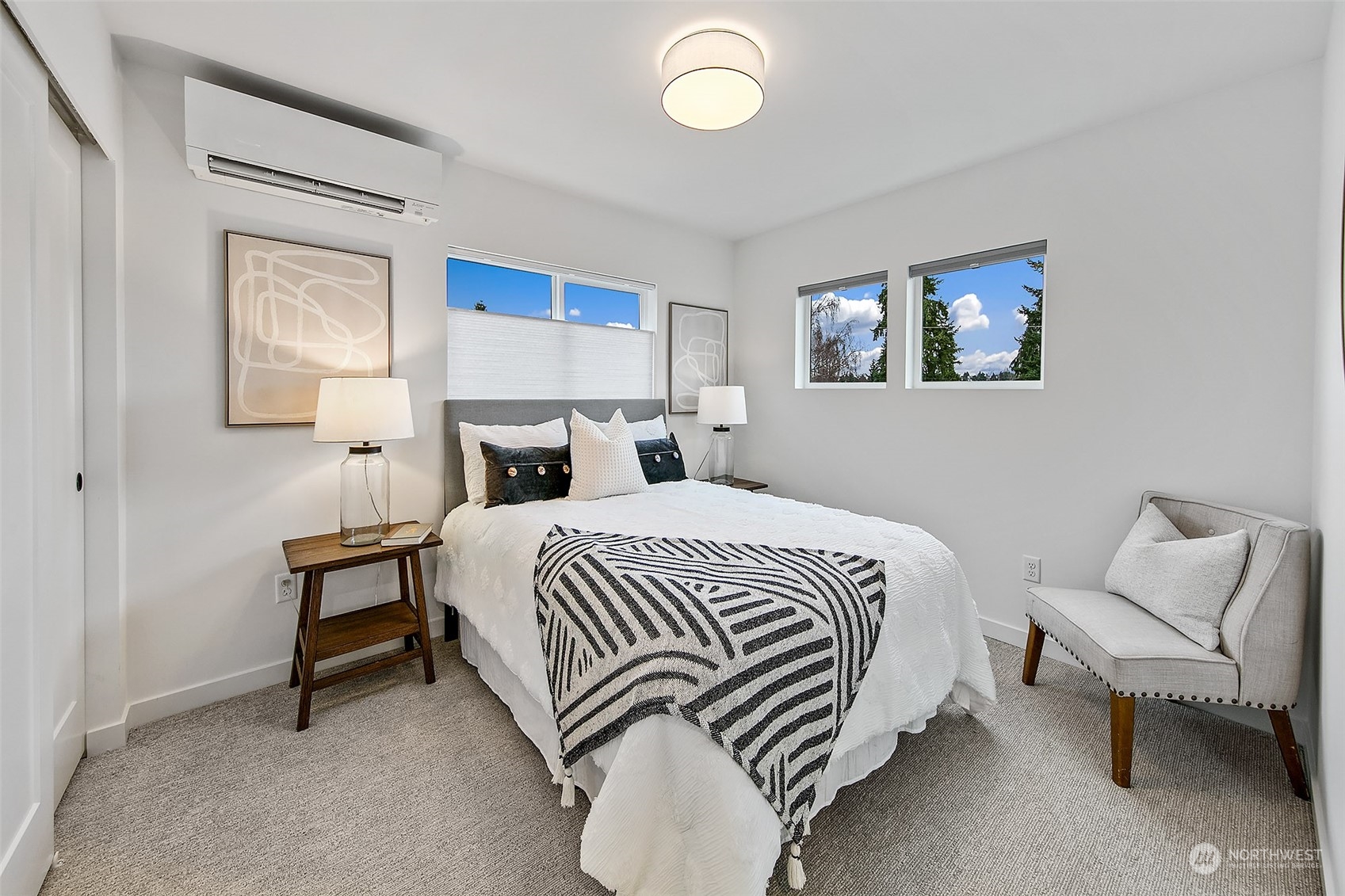 8855 29th Avenue Southwest Seattle, WA 98126 - Photo 15 of 20 a bedroom with a bed and chair