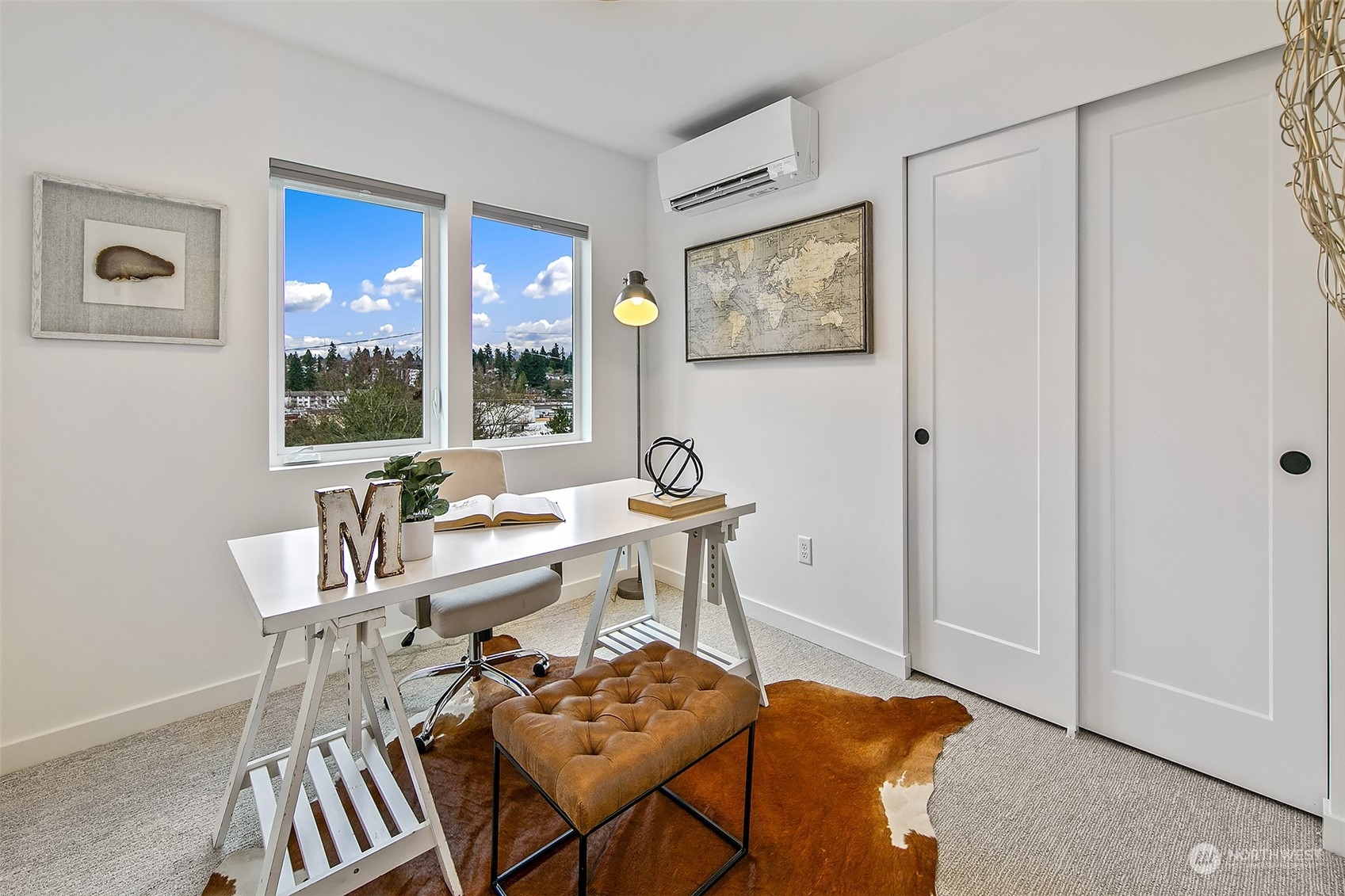 8855 29th Avenue Southwest Seattle, WA 98126 - Photo 16 of 20 a view of a dining room with furniture large windows and wooden floor