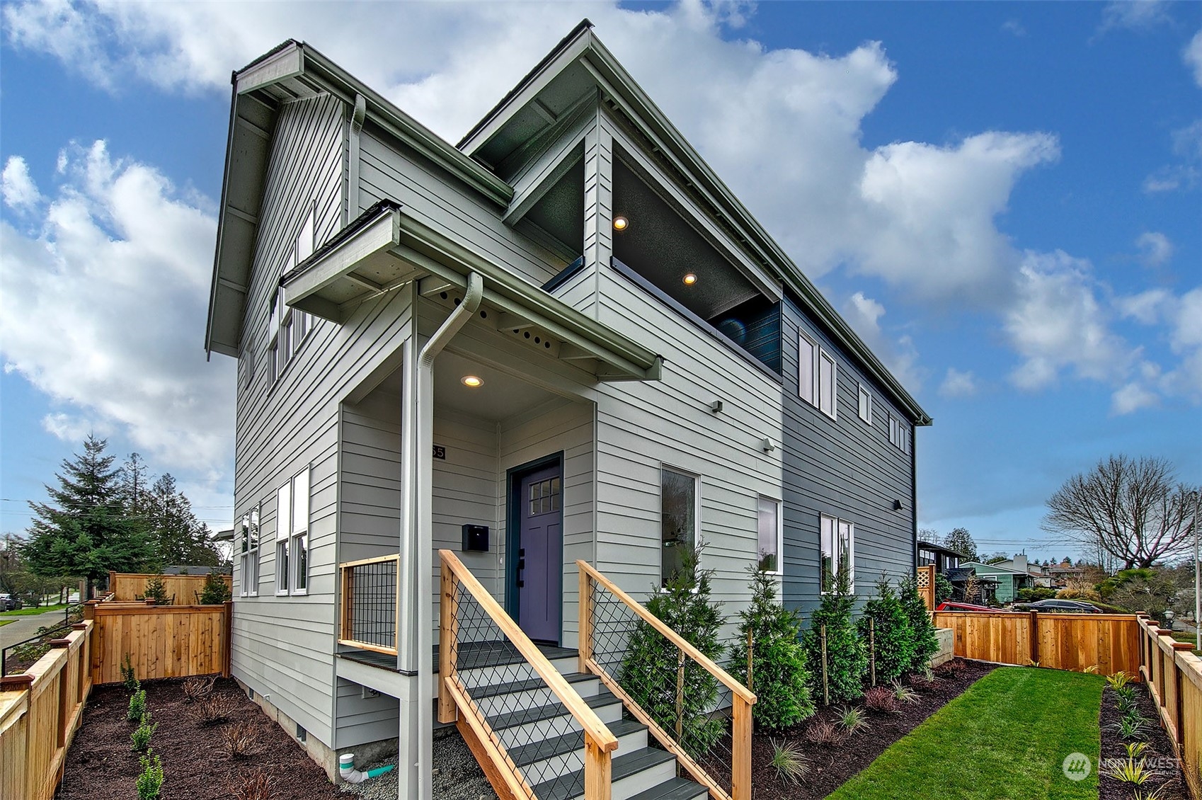 8855 29th Avenue Southwest Seattle, WA 98126 - Photo 2 of 20 a view of house with yard and front door