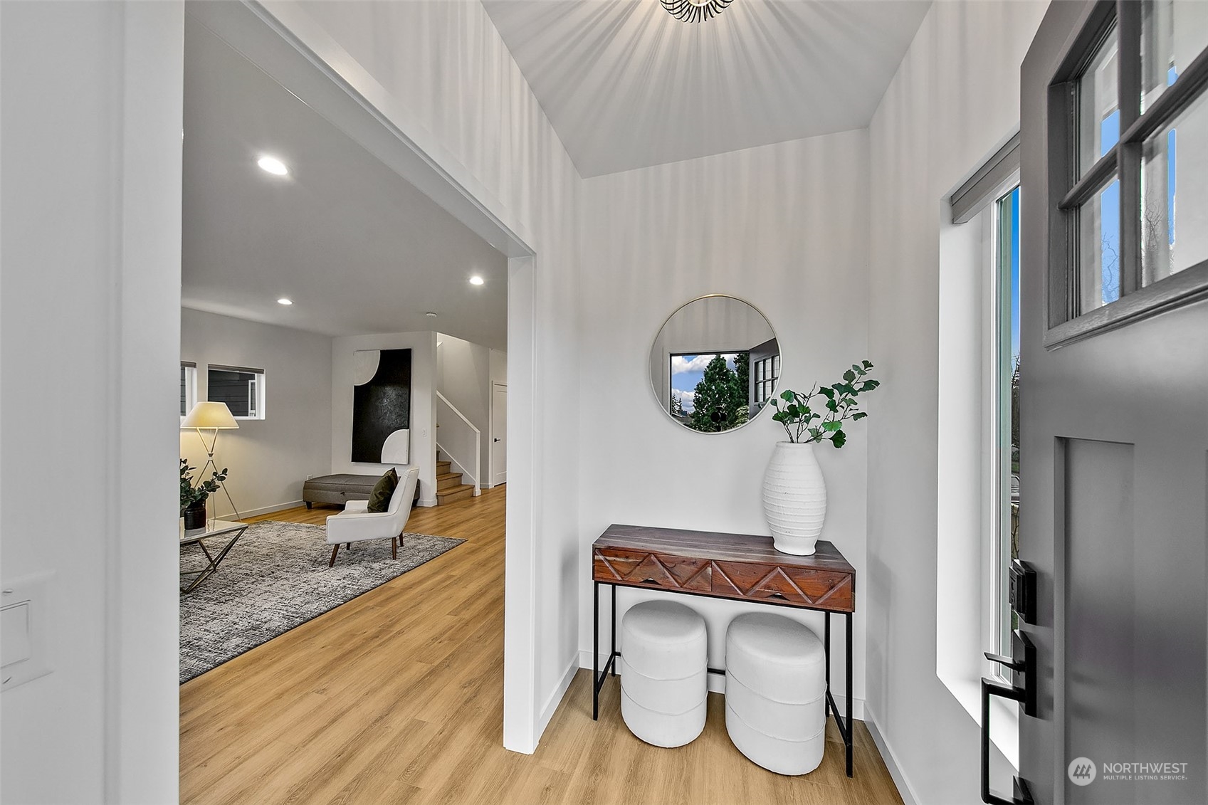 8855 29th Avenue Southwest Seattle, WA 98126 - Photo 4 of 20 a living room with furniture and a mirror