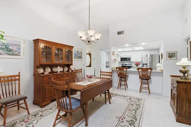 a view of a dining room with furniture