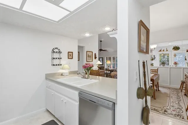 a view of kitchen island with furniture and wooden floor