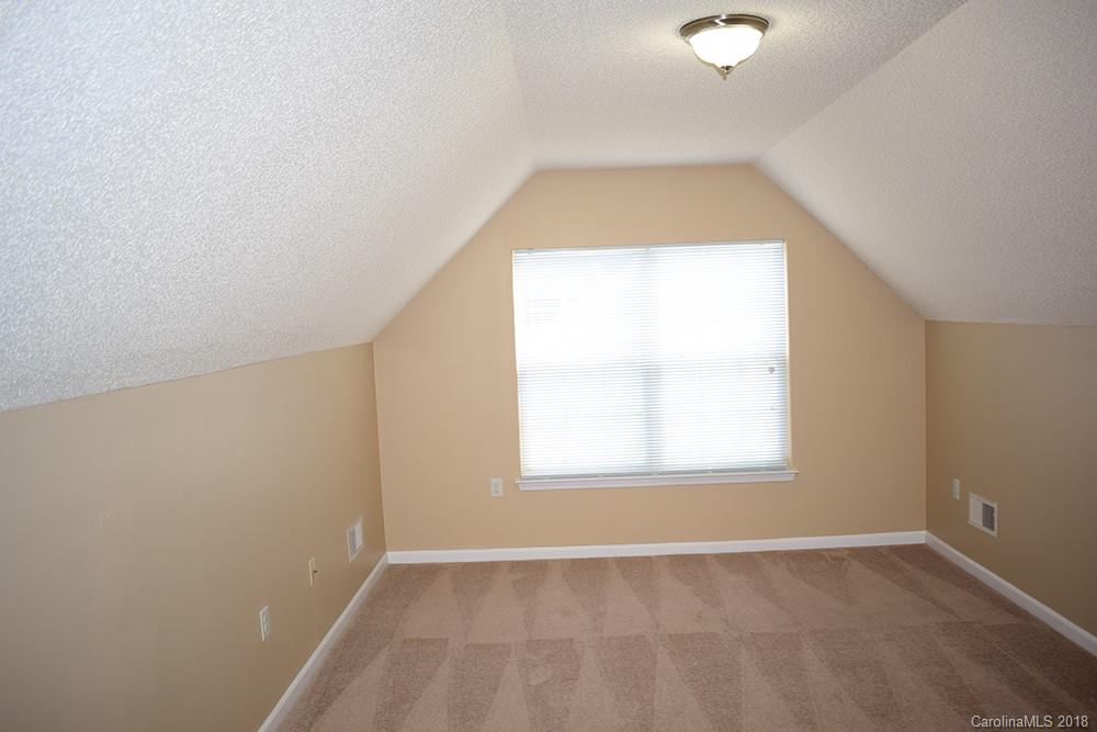138 Bluffton Road Mooresville, NC 28115 - Photo 13 of 19 an empty room with a window