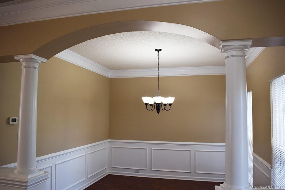 138 Bluffton Road Mooresville, NC 28115 - Photo 3 of 19 a view of empty room with wooden floor