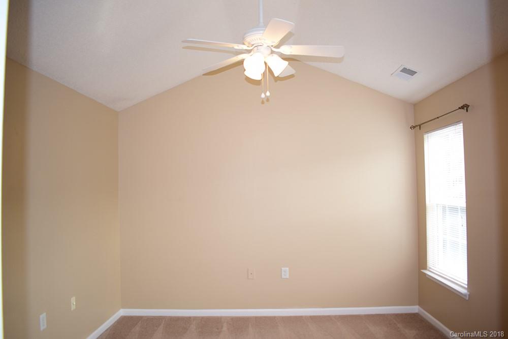 138 Bluffton Road Mooresville, NC 28115 - Photo 7 of 19 a view of an empty room with a window