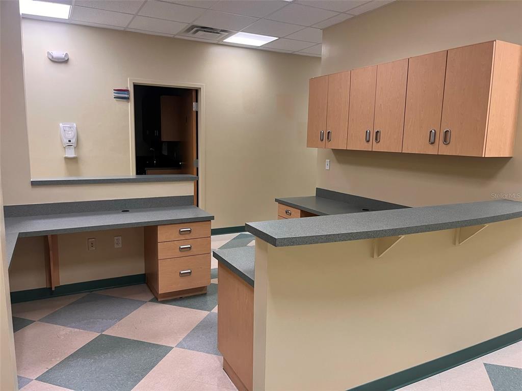 5999 Dundee Road, Unit 800 Winter Haven, FL 33881 - Photo 14 of 20 a utility room with cabinets