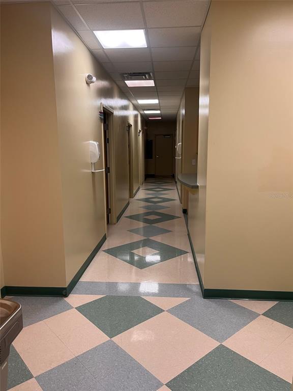 5999 Dundee Road, Unit 800 Winter Haven, FL 33881 - Photo 5 of 20 a view of a hallway with a white walls