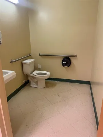 a kitchen with a cabinets and a stove top oven