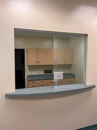 a room with chair and table