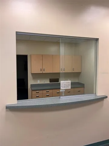 a room with chair and table