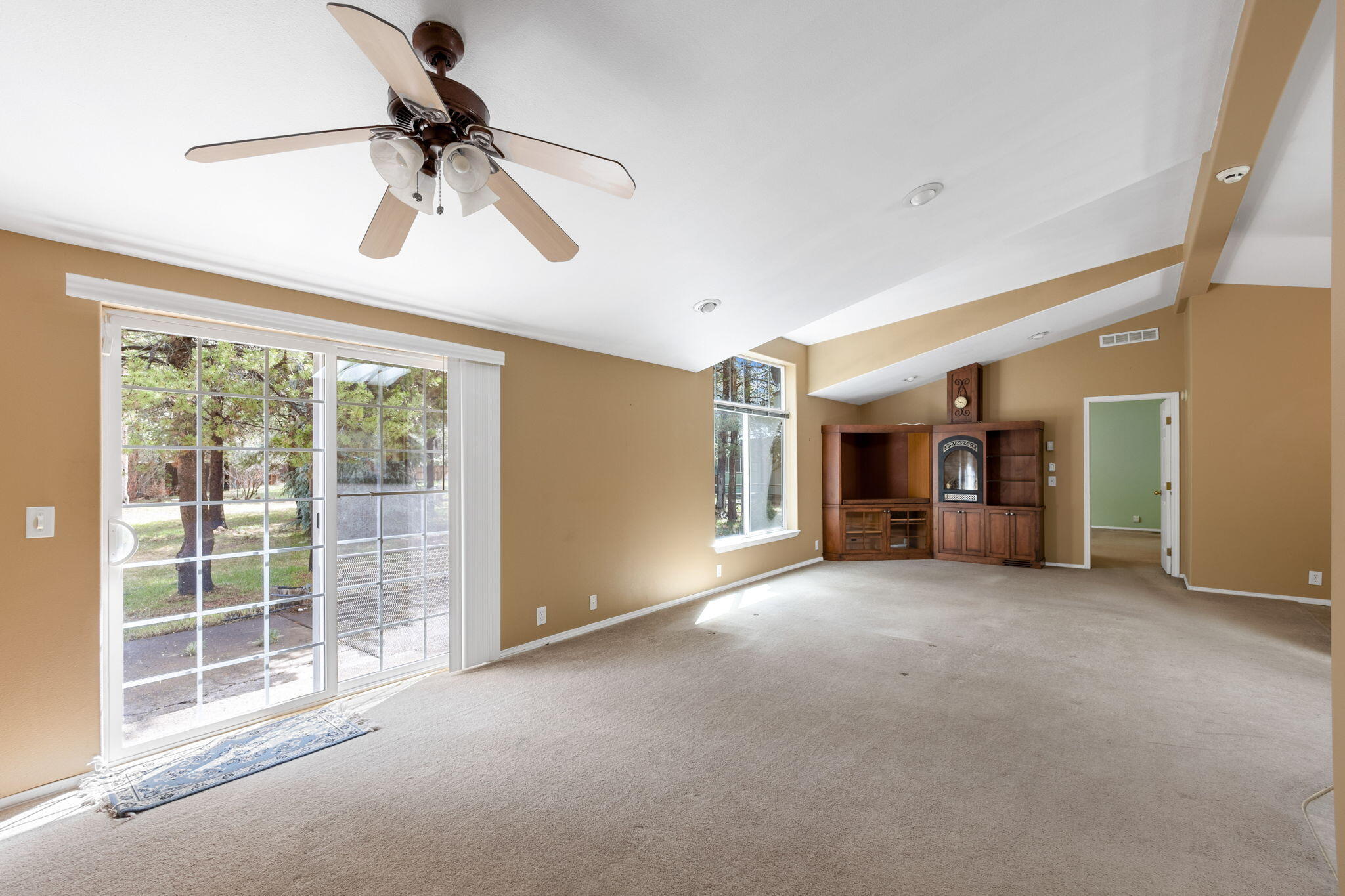 55870 Blue Eagle Road Bend, OR 97707 - Photo 21 of 41 Great room with cozy propane fireplace